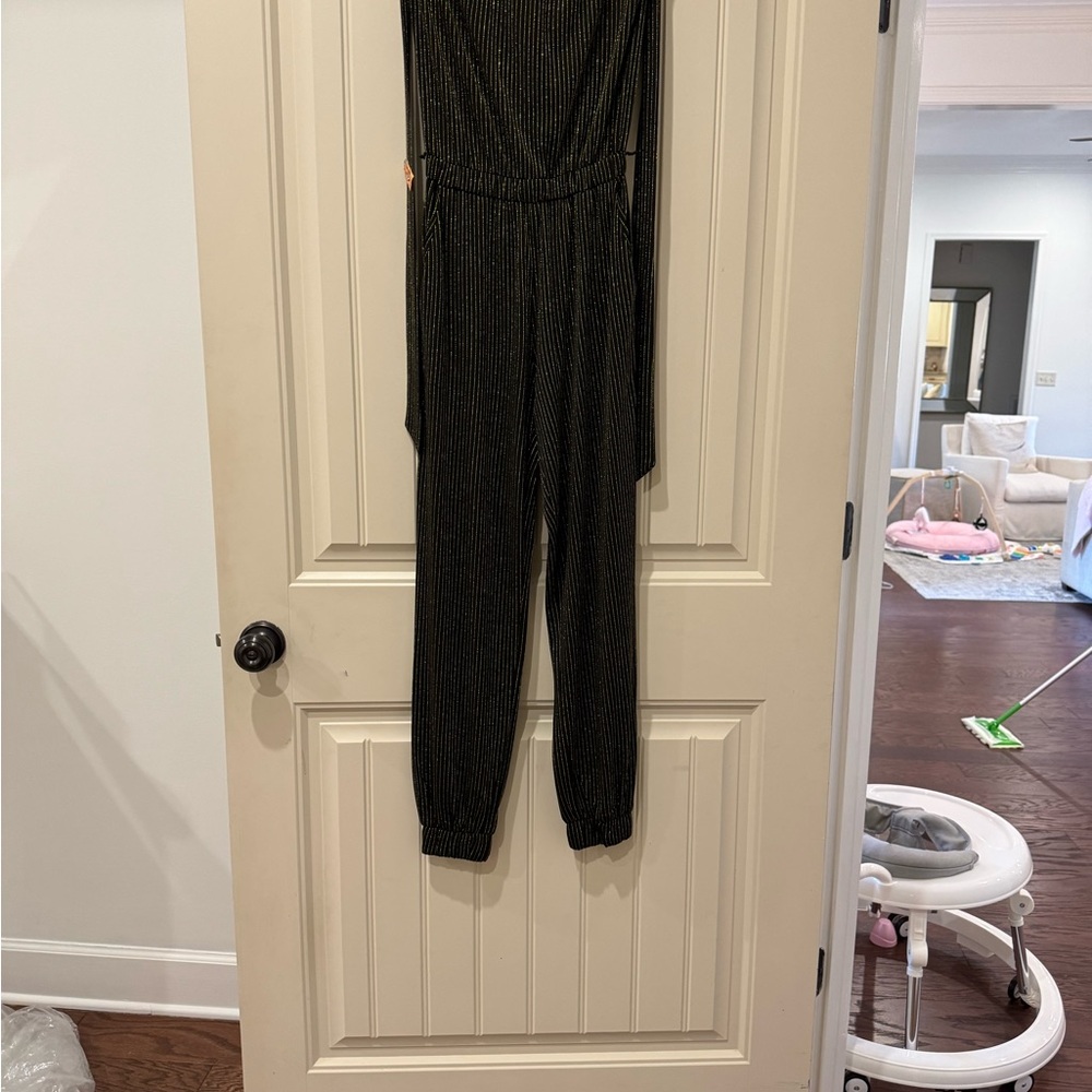Black Jumpsuit with Gold Stripes
